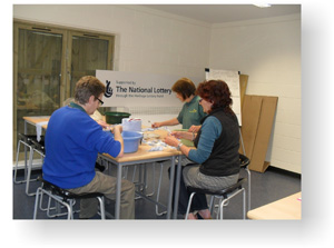 Volunteers processing the fieldwalking finds.