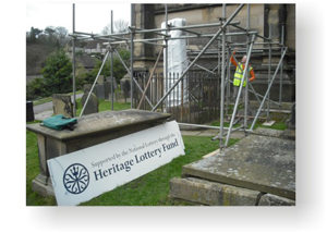 Preparing the site for the excavation, with careful protection in place for the fragile sculpture