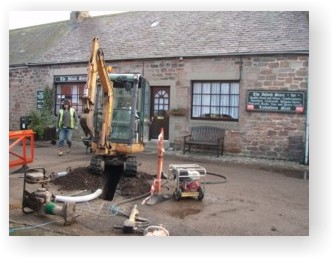 A watching brief being carried out during the installation of some services on Holy Island