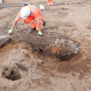 ARS Ltd team member excavating an Iron Age furnace on-site at Lochinver © Copyright ARS Ltd 2022